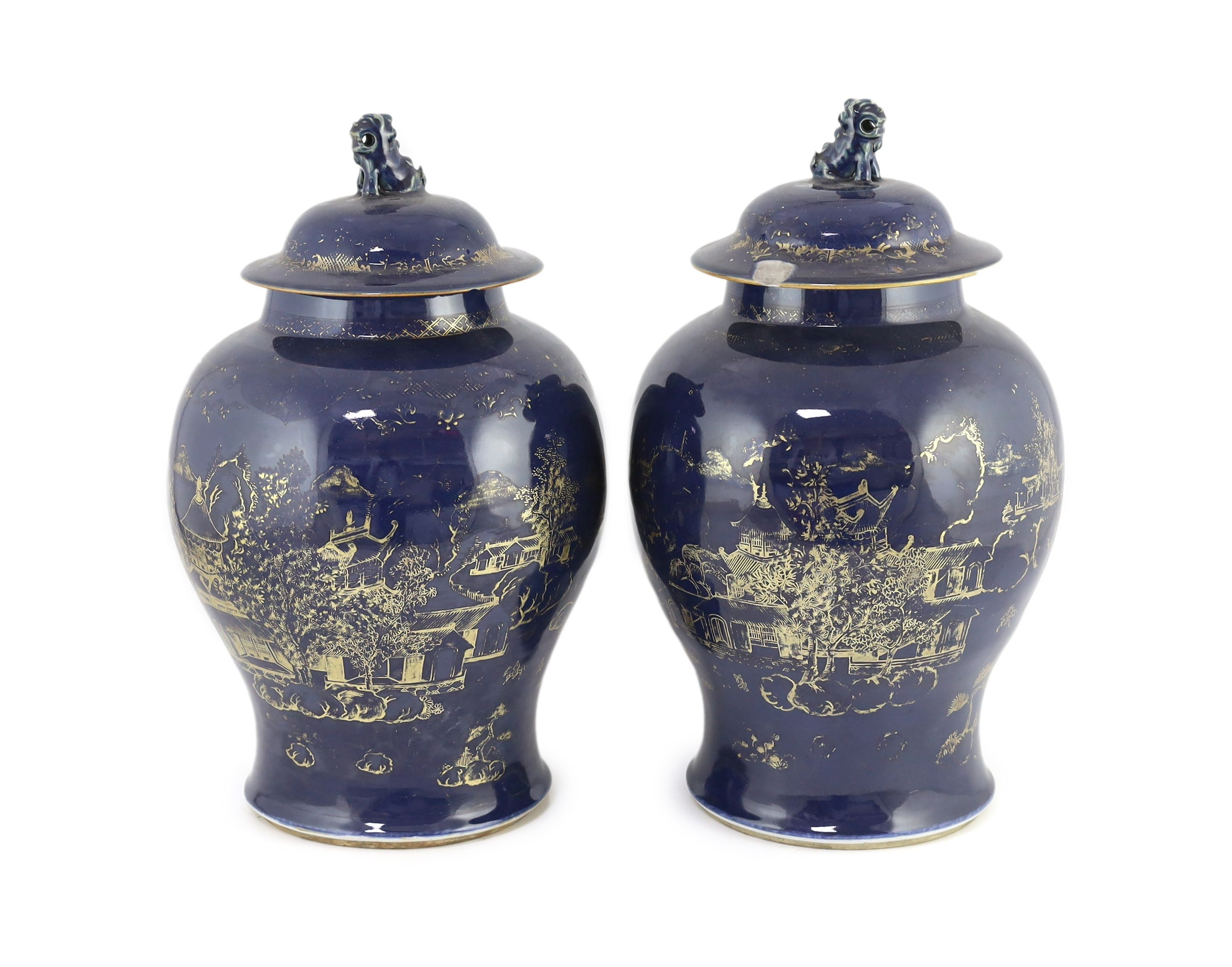 A pair of Chinese gilt-decorated blue ground baluster vases and covers, 19th century, 44 cm high